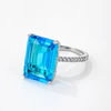 15Ct Rhodium Plated Aqua Blue Emerald Cut Pave Ring